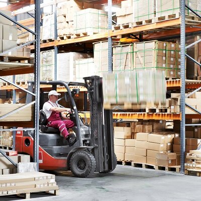 Forklift warehouse Forklift truck between storage shelfs