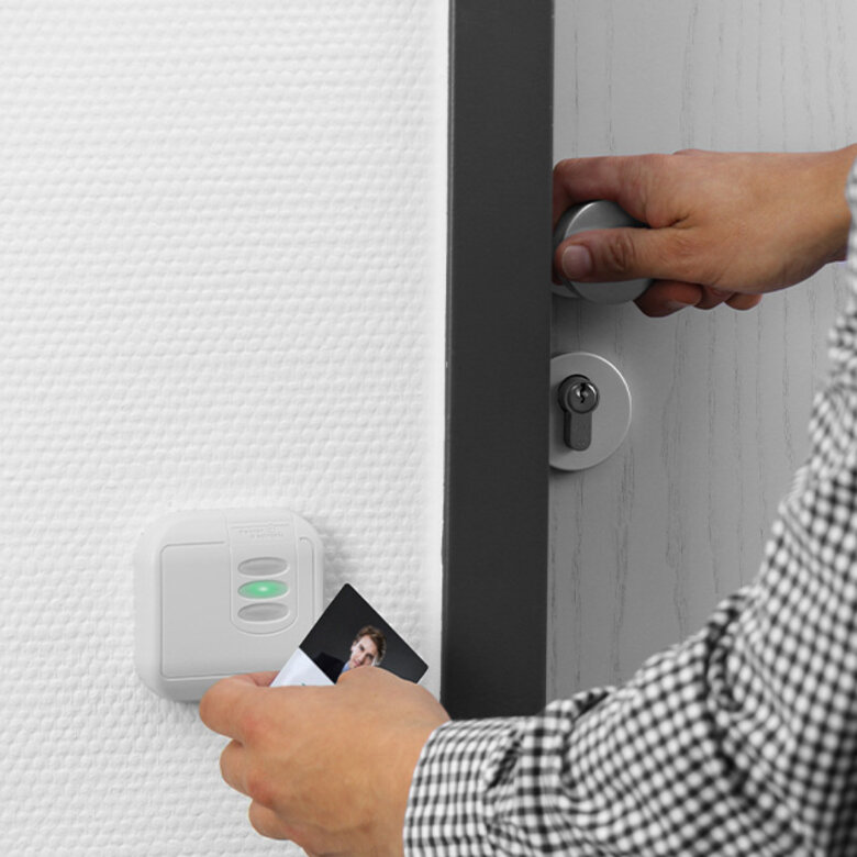 1992 proxEntry access control reader proxEntry card is held in front of a reader